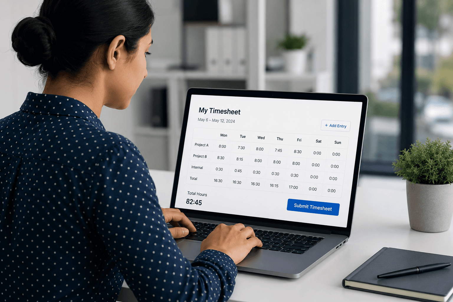 An employee filling in weekly project hours on a timesheet screen before submitting